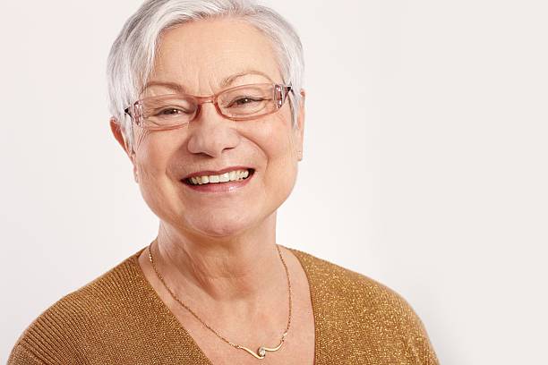 istock Portrait of happy elderly lady 185313485