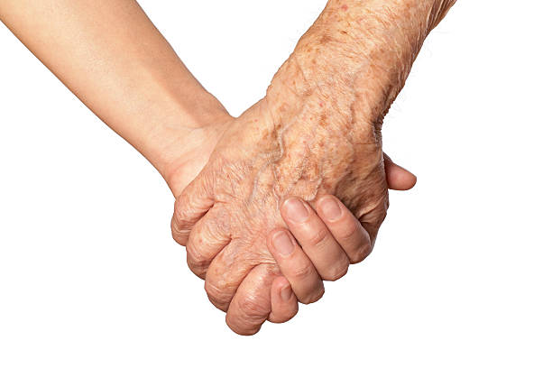 Holding hands stock photo