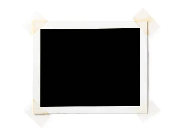 Blank photo with clear tape isolated on white Background.