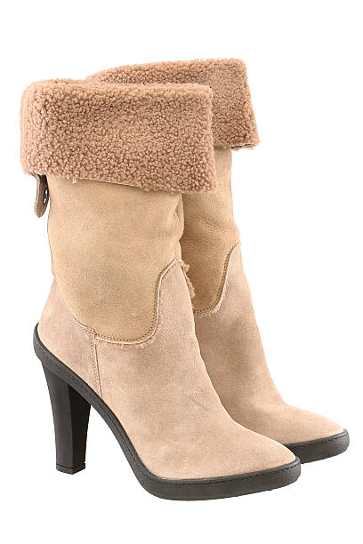 Beige high heeled winter boots