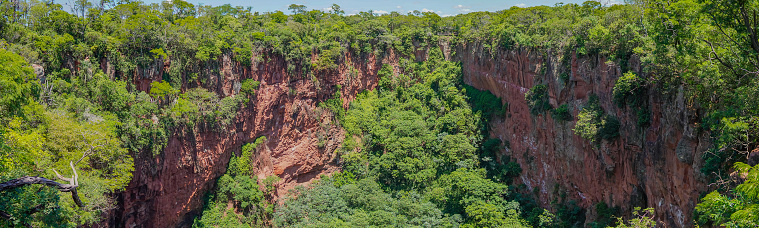 Panoramic image of the Buraco das Araras sinkhole, in the city of Jardim, in the Pantanal of Mato Grosso do Sul. Buraco das Araras is one of the largest sinkholes in the world, approximately 100 meters deep and 500 meters in circumference.