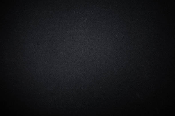 Dark texture background of black fabric Dark texture backgrounds with spotlight. Studio shot. drab stock pictures, royalty-free photos & images