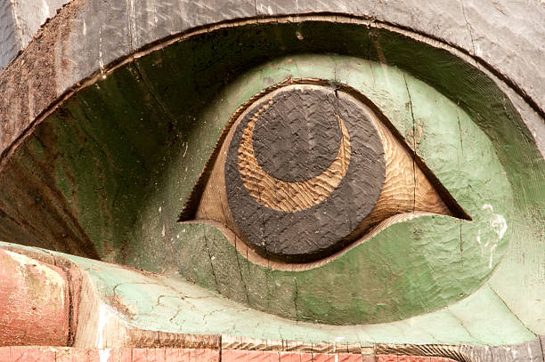 Native American Totem Pole Close-up of a Native American Totem Pole in Seattle. pacific northwest totem poles stock pictures, royalty-free photos & images