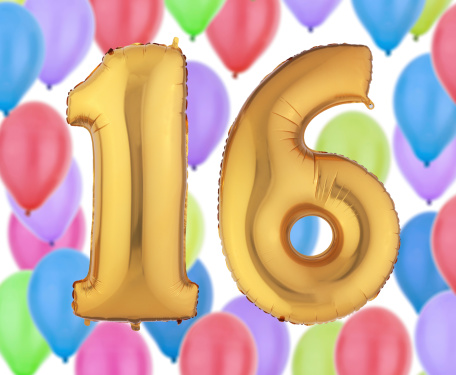 gold helium balloons highlighting number sixteen