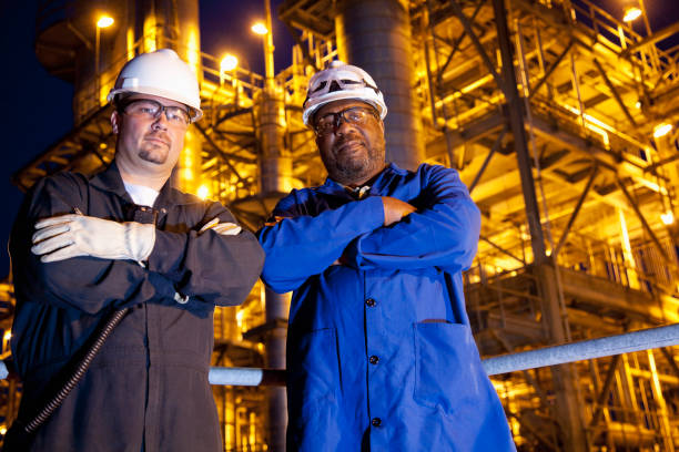 istock Workers, chemical plant at night 185318726