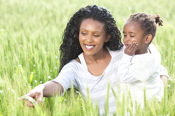 istock Quality time- mother and daughter at wheat field. 185318817