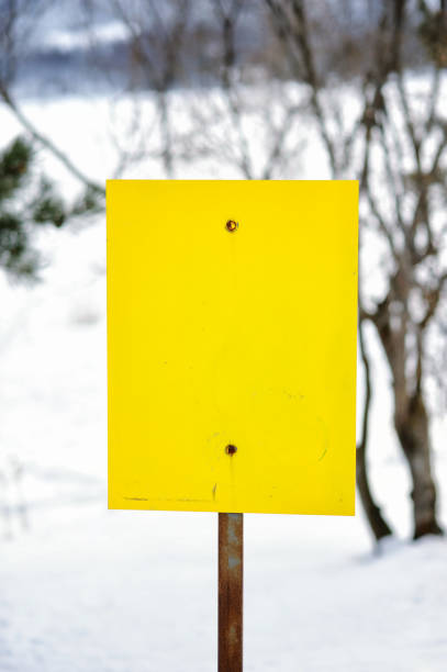 istock Blank yellow sign in winter 185319072