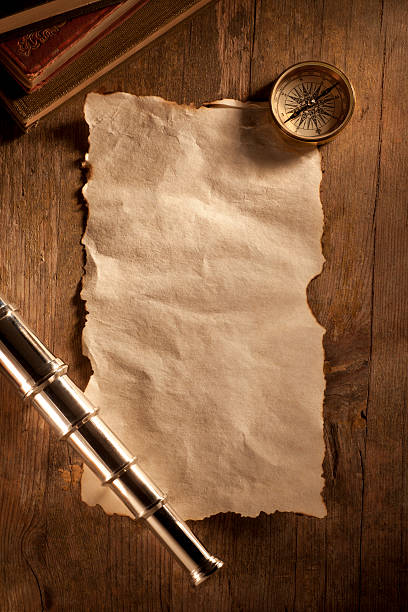 istock Antique Paper on a Wooden Desk 185319281