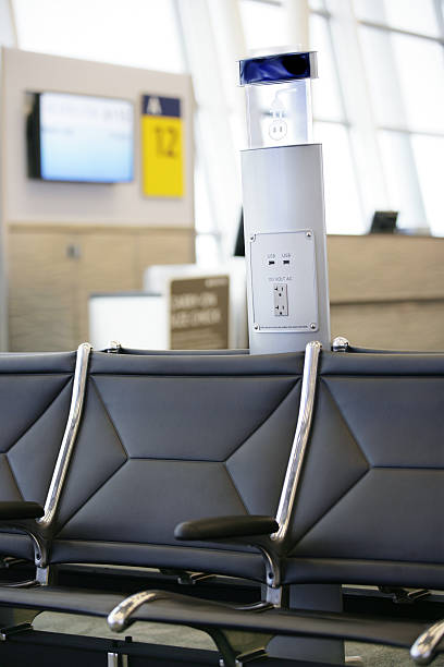 istock power outlet at airport gate 185319341
