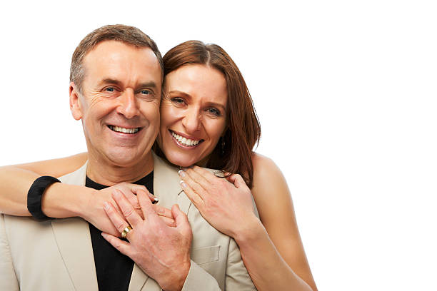 Portrait of smiling couple in casual clothes, isolated on white background