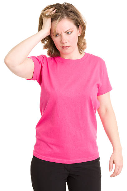 istock Confused Young Woman Rubs Head 185319568