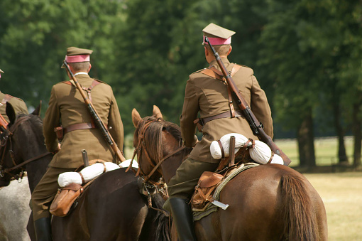 Closeup of soldiers legs and guns for design purpose