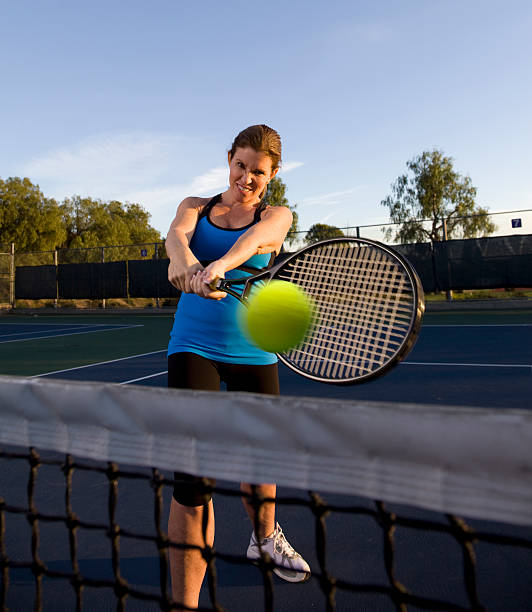 istock Woman Playing Tennis 185319941