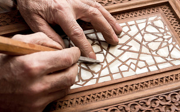 Repairing "Repairing an antique furniture part, 19th century, Ottoman Empire age." inlay stock pictures, royalty-free photos & images