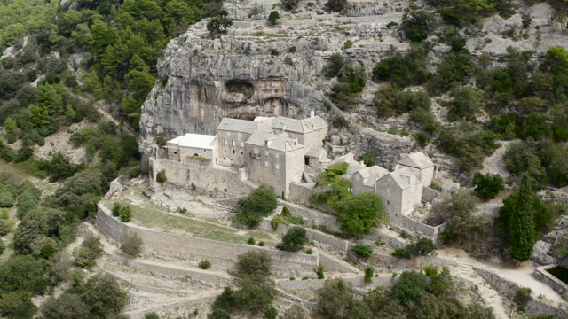 Panorama Of Famous Pustinja Blaca Hermitage In Stone Desert, Brac Island, Dalmatia, Croatia. Aerial Shot