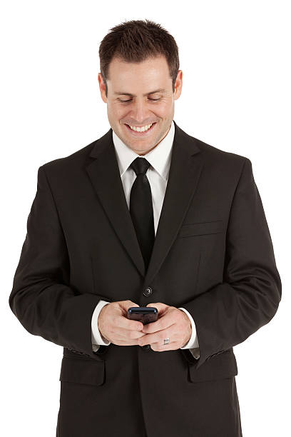 istock Attractive businessman using a mobile phone 185320774
