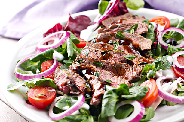 Fillet of beef with salad Fillet of beef with salad steak salad stock pictures, royalty-free photos & images