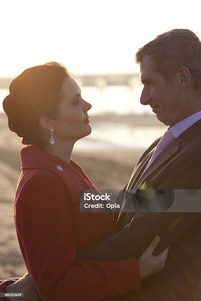 Mid aged couple in love Mid aged couple in love backlit  30-39 Years Stock Photo