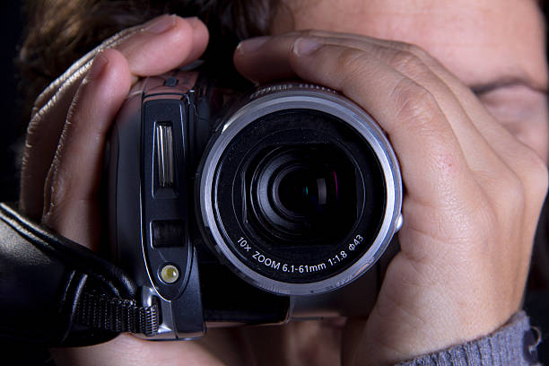 istock Woman with handy cam 185321852