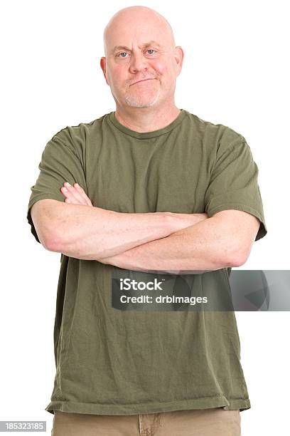 Smirking Man With Arms Crossed Stock Photo - Download Image Now - Men, Suspicion, Arms Crossed