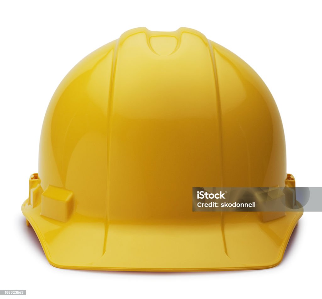 Construction Helmet on White This is a photo of a yellow construction helmet isolated on a white background. There is a clipping path included with this file.Click on the links below to view lightboxes. Hardhat Stock Photo