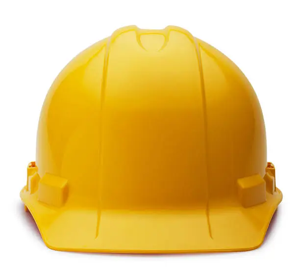 This is a photo of a yellow construction helmet isolated on a white background. There is a clipping path included with this file.Click on the links below to view lightboxes.