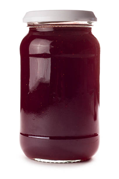 istock Glass preserve jar with no label on a white background 185323855
