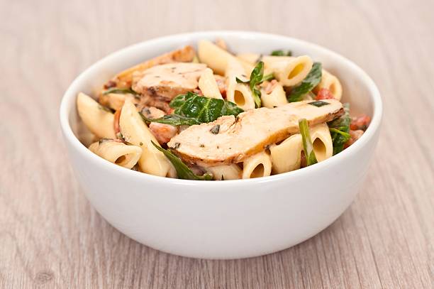 Pasta Salad Pasta Salad with Chicken and Basil chicken rigatoni stock pictures, royalty-free photos & images