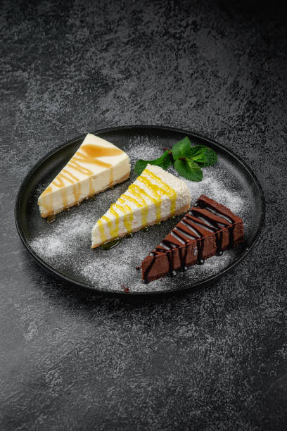 istock Cheesecakes in assortment, cream, chocolate 1853239487