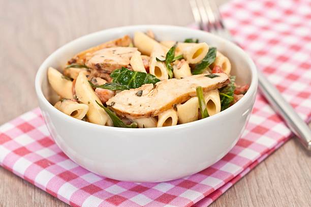 Pasta Salad Pasta Salad with Chicken and Basil chicken rigatoni stock pictures, royalty-free photos & images