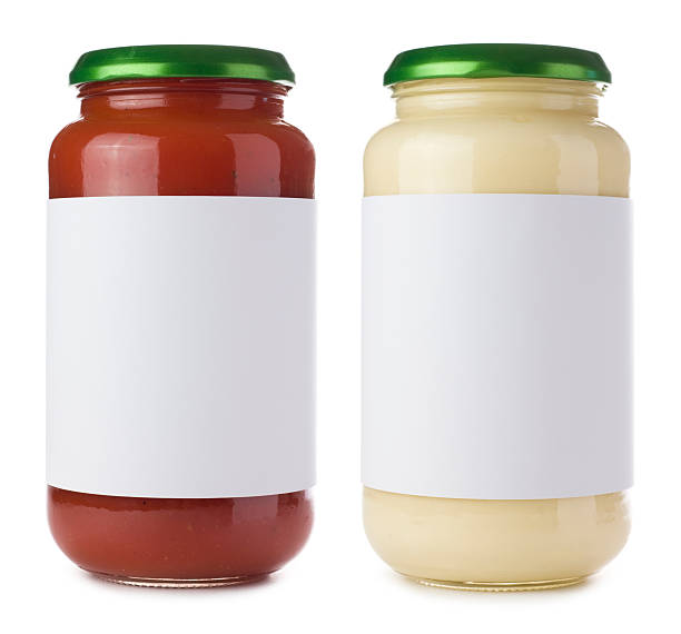 стекло паста соус и банки на белом фоне - tomato sauce jar стоковые фото и изображения