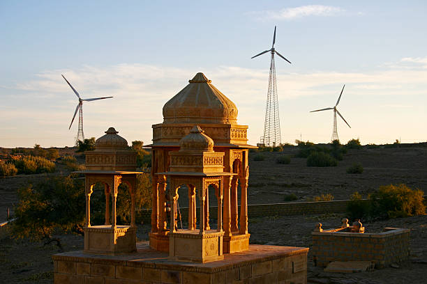 Bada Bagh with wind turbines "Bada Bagh, Big Garden, with wind turbines in the background in early morning near Jaisalmer in Rajasthan, India." rajasthan stock pictures, royalty-free photos & images