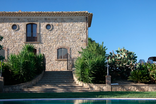 mediterreanian landhouse in summer with pool