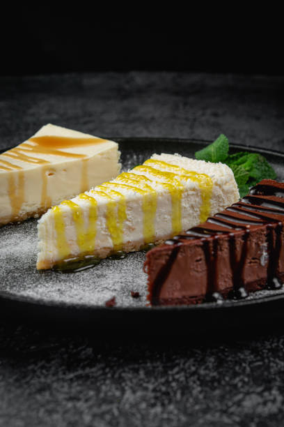 istock Cheesecakes in assortment, cream, chocolate 1853241589
