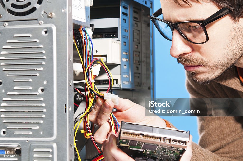 Fixing Computer Hard Way Man Fixing Computer Stock Photo - Download Image Now - Hard Drive ...