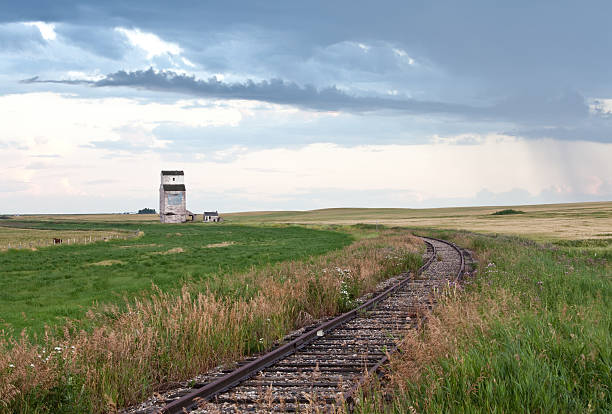 istock Old Grain Elevator and Railway Tracks on the Plains 185324408