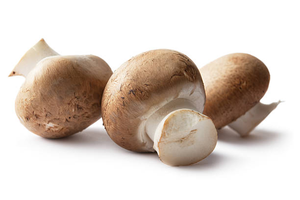 istock Mushrooms: Crimini Mushrooms Isolated on White Background 185324429