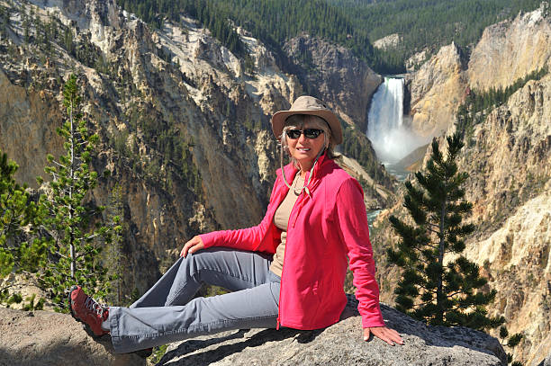 istock Tourist at Yellowstone waterfall 185324483
