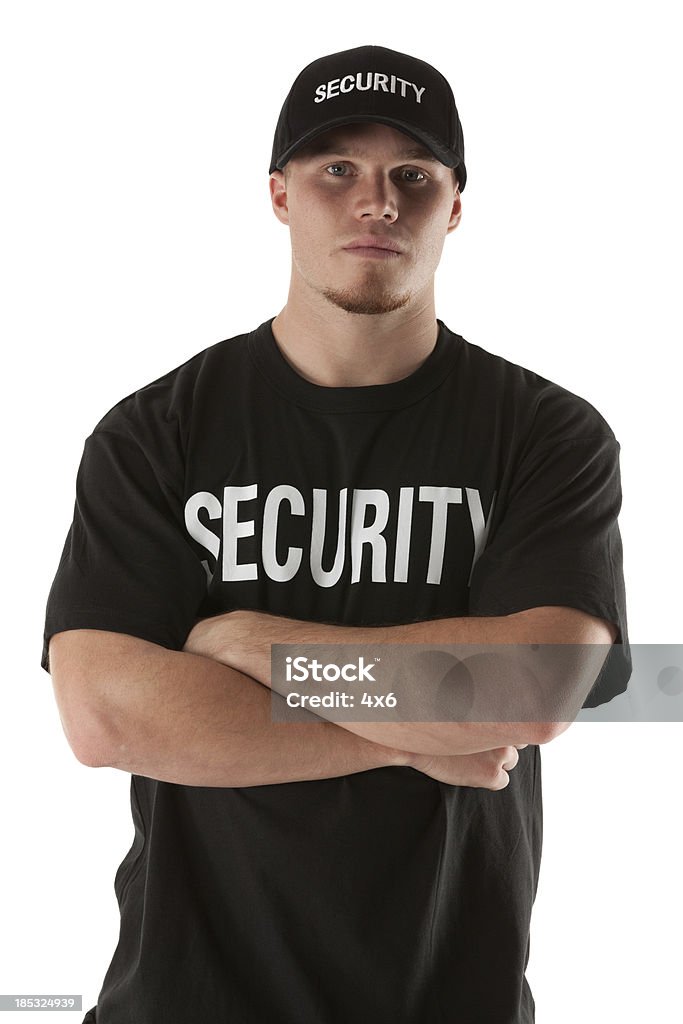 Agent de sécurité debout avec ses bras croisés - Photo de Agent de sécurité libre de droits