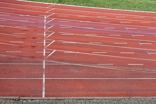 istock Red race lanes on an athletics running track 185325067