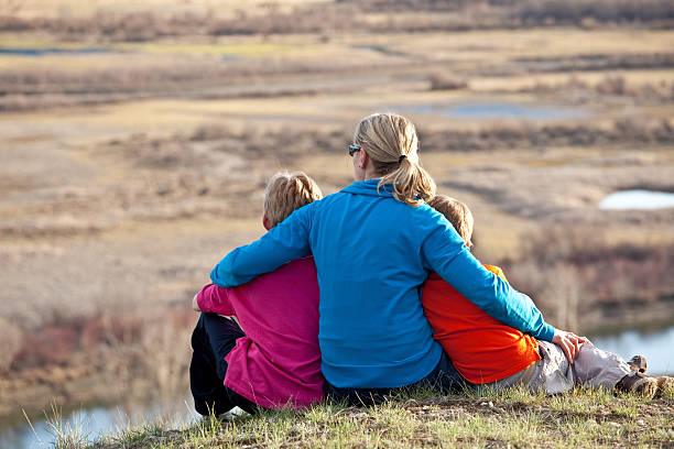 istock Family Admiring A Beautiful Valley View 185325251