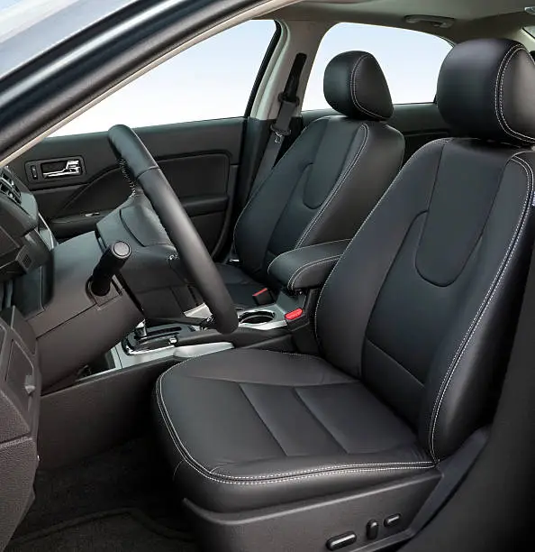 "Generic interior of a brand new, 2012 american sedan, with all logos and distinguishing markings removed."
