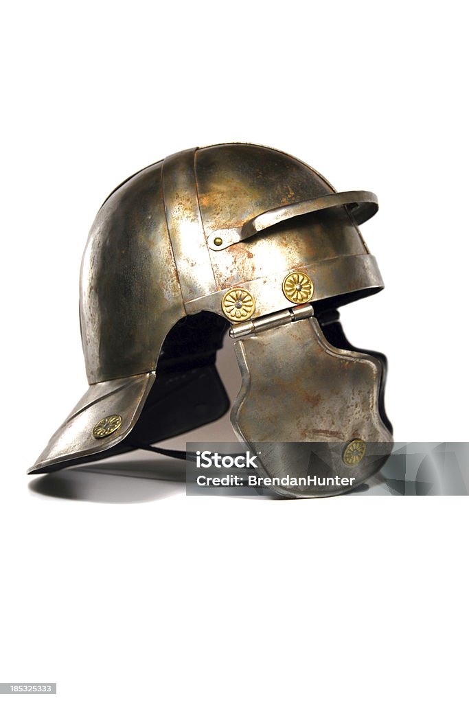 Warriors History A Roman helmet on a white background. Helmet Stock Photo