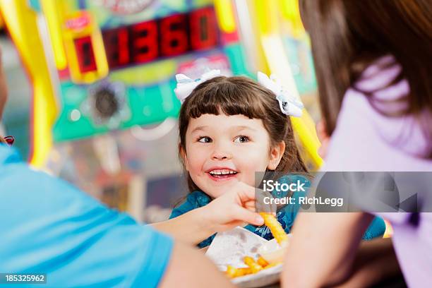 Happy Little Girl Stock Photo - Download Image Now - Amusement Arcade, Child, Arcade