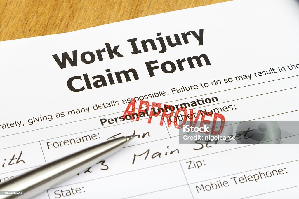 Arbeit Verletzungen Anspruch genehmigt von - Lizenzfrei Antragsformular Stock-Foto