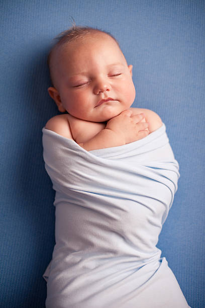 istock Color Image of Sleeping Baby Boy, on Blue Background 185327403