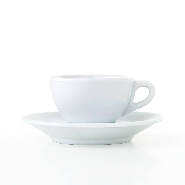 Coffee cup and saucer isolated on white background stock photo
