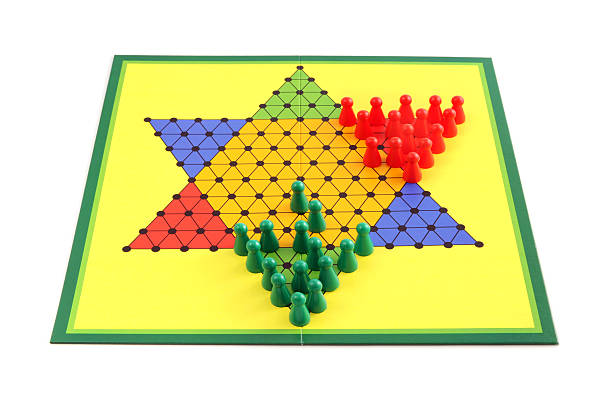 Board game chinese checkers Board game chinese checkers isolated on white background. The game just started. chinese checkers stock pictures, royalty-free photos & images