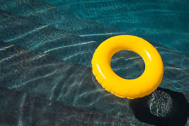 istock Swimming tube in the pool 185328479