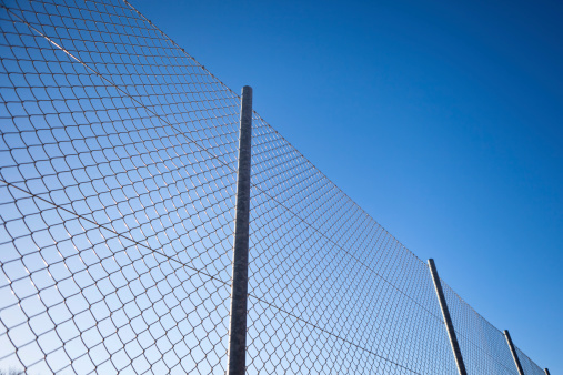 Fence with barbwire